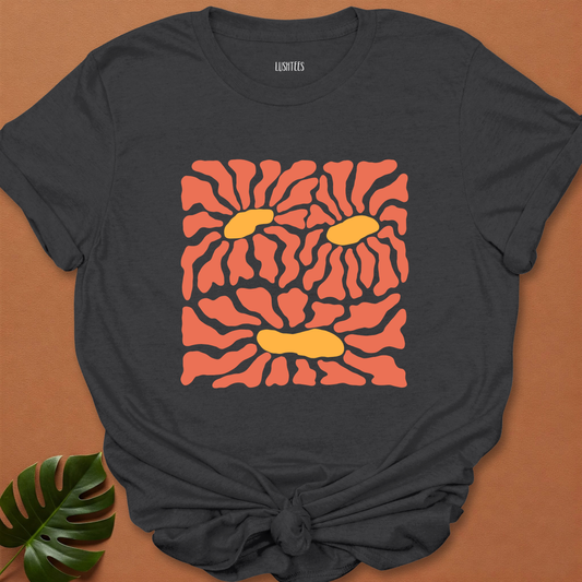 Burnt Coral Daisies – Abstract Sunrise Bloom Tee